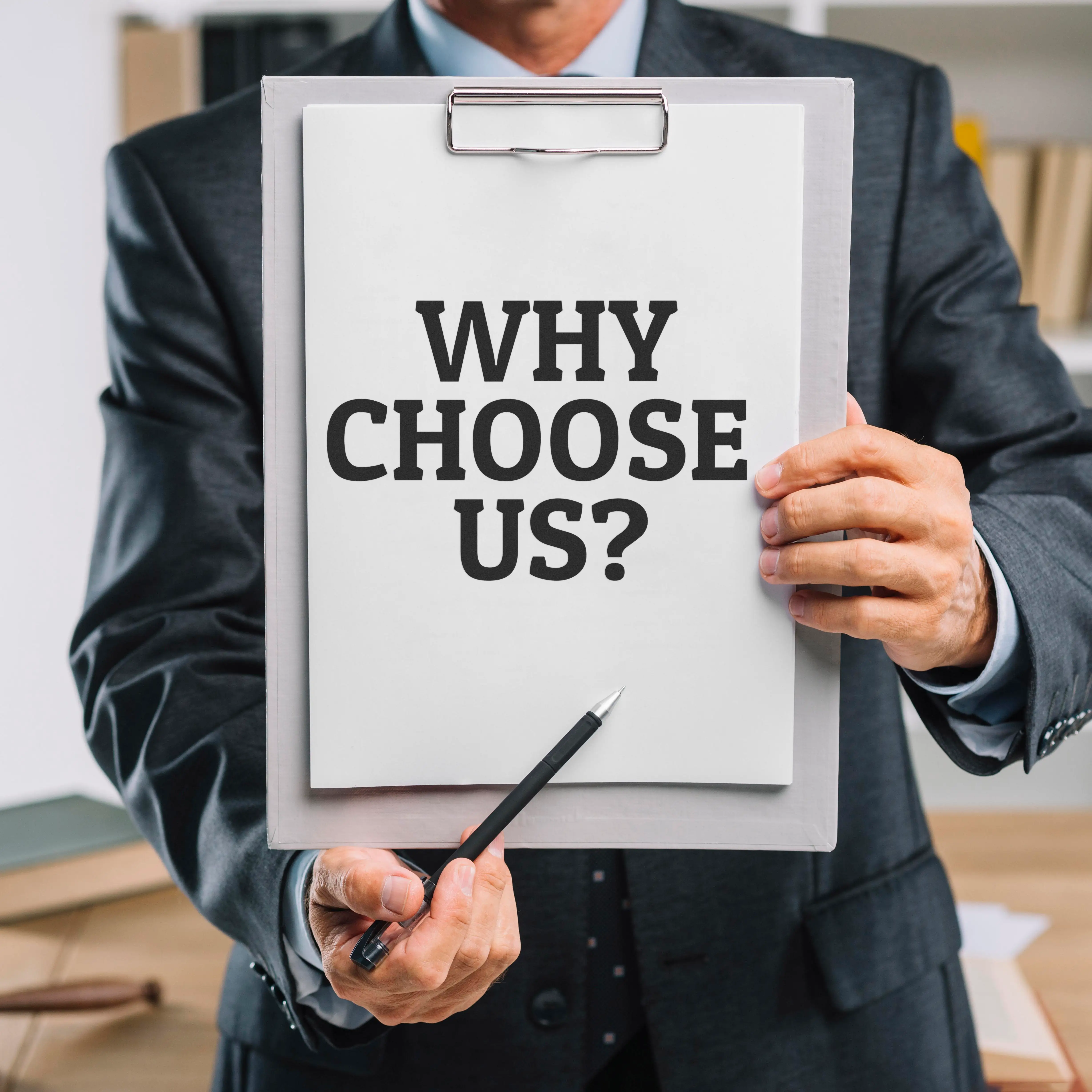 Businessman holding clipboard with 'Why Choose Us?' text